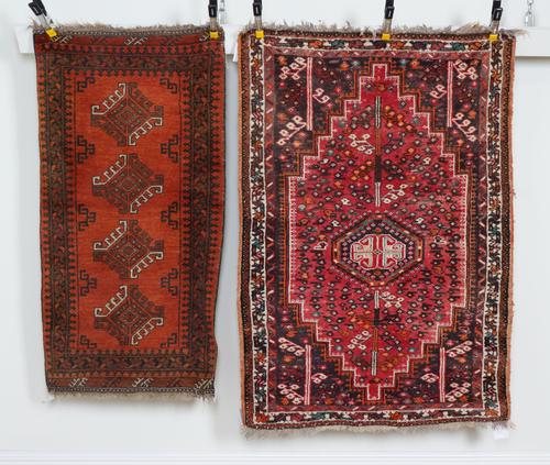 A GROUP OF THREE RUGS (3)
