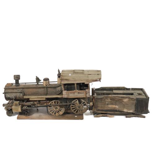 OF FOLK ART INTEREST: A SCRATCH BUILT WOOD AND METAL MOUNTED LOCOMOTIVE AND TENDER (2)