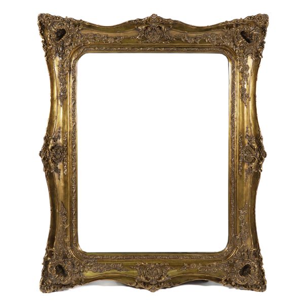 A LARGE GILT FRAMED RECTANGULAR WALL MIRROR