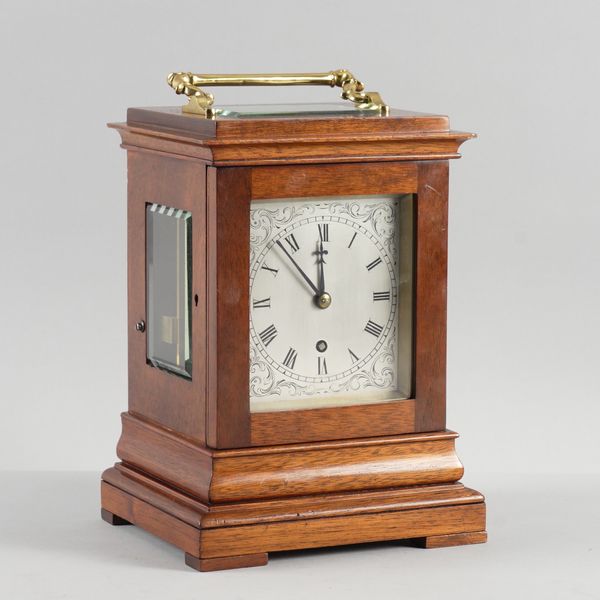 A FOUR-GLASS MAHOGANY FUSÉE LIBRARY TIMEPIECE