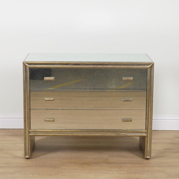 JULIAN CHICHESTER, TEMPLE RANGE; A MIRRORED PARCEL GILT THREE DRAWER CHEST