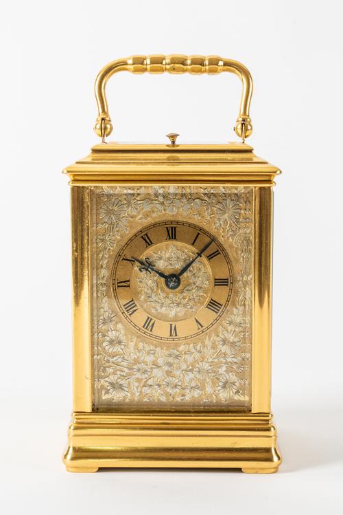 A FRENCH GILT BRASS STRIKING AND REPEATING CARRIAGE CLOCK