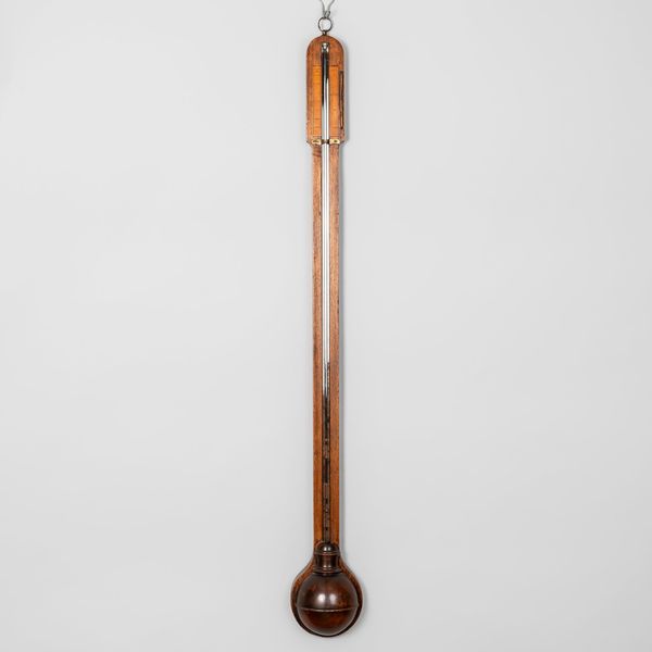 A WILLIAM IV MAHOGANY STICK BAROMETER