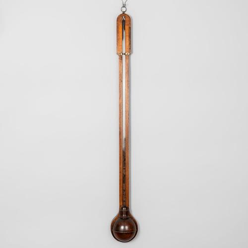 A WILLIAM IV MAHOGANY STICK BAROMETER