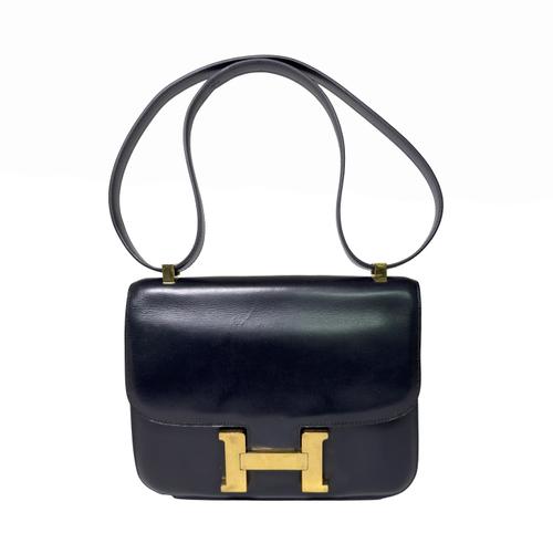 HERMES, PARIS: A DARK BLUE LEATHER 'CONSTANCE' HANDBAG