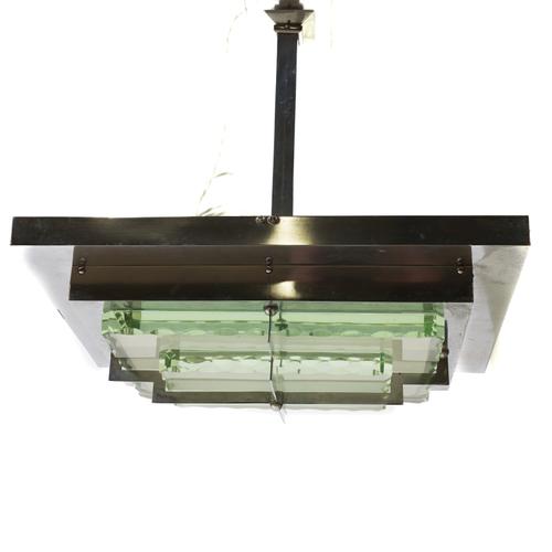 A CHROME-PLATED AND GLASS PENDANT LIGHT