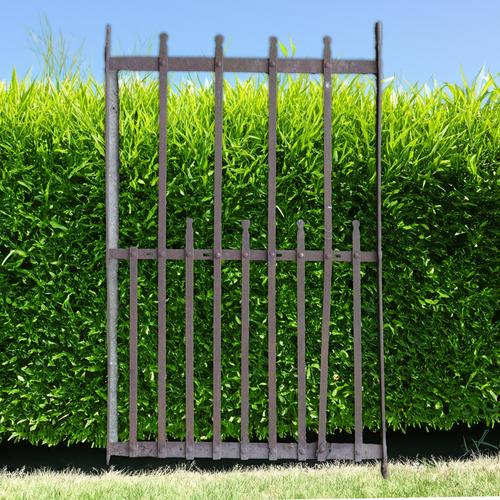 AN EARLY 20TH CENTURY STRAP IRON GARDEN GATE