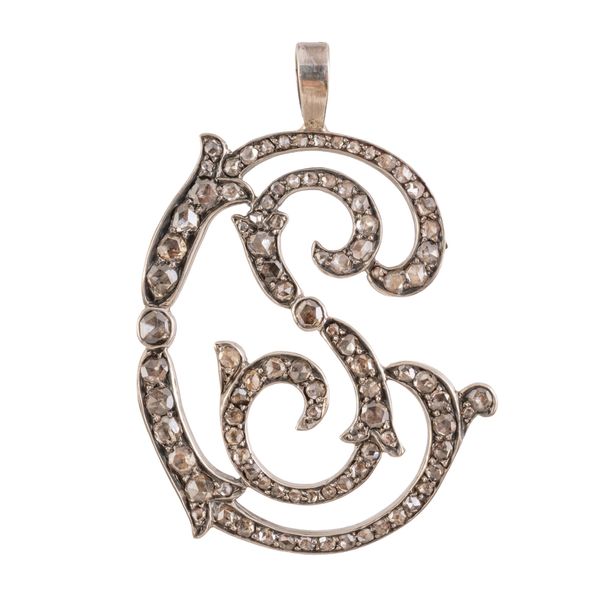 A DIAMOND MONOGRAM PENDANT