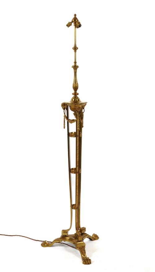 A ROBERT ADAM STYLE GILT-METAL TORCHERE OR FLOOR STANDING LIGHT