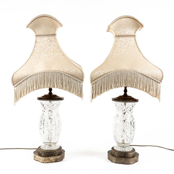 A PAIR OF CUT GLASS AND WHITE METAL TABLE LAMPS (2)