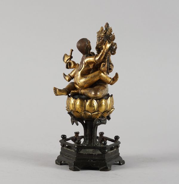 A NEPALESE GILT-BRONZE TANTRIC GROUP OF BUDDHA SITASAMVARA IN YAB-YUM