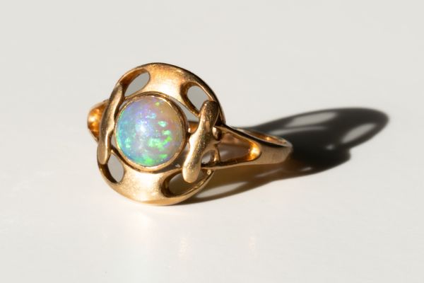 AN ART NOUVEAU OPAL RING