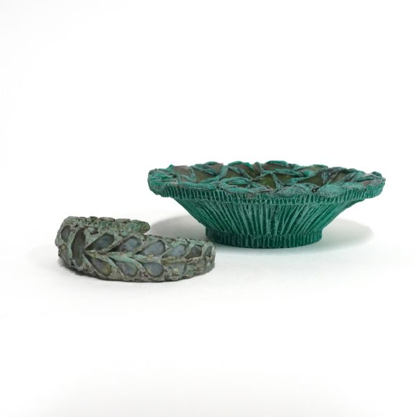 PROBABLY LINE VAUTRIN, (FRENCH,1913-1997): A RESIN AND MIRROR GLASS SMALL DISH AND A WRIST BANGLE (2)