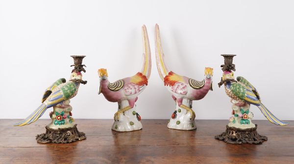 A PAIR OF GILT-METAL MOUNTED PORCELAIN PARROT CANDLESTICKS AND A PAIR OF PORCELAIN BiRDS (4)