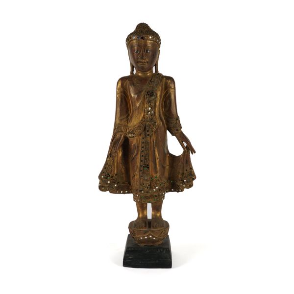 A SOUTH EAST ASIAN CARVED WOOD STANDING BUDDHA FIGURE