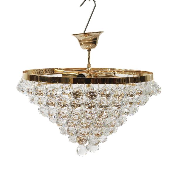 A GILT LACQUERED METAL AND FACETTED GLASS FOUR LIGHT CHANDELIER