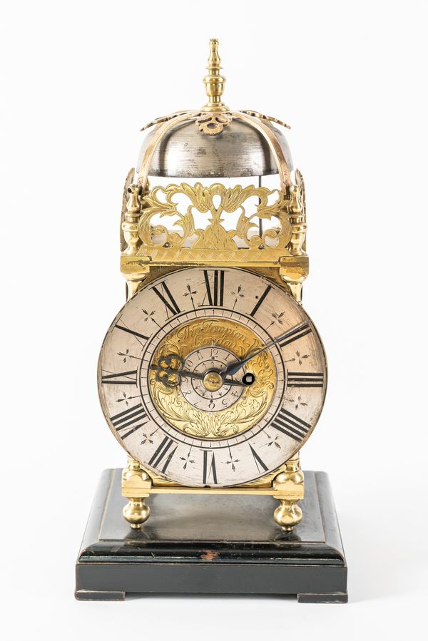 A MINIATURE BRASS LANTERN CLOCK WITH ONE-IN-PASSING HOUR STRIKE