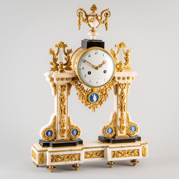 A LATE LOUIS XVI ORMOLU, PORCELAIN-MOUNTED MARBLE MANTEL CLOCK