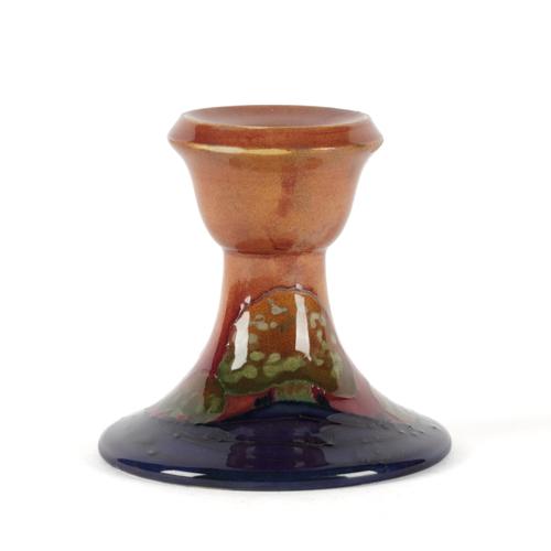 A MOORCROFT `EVENTIDE' PATTERN CANDLESTICK