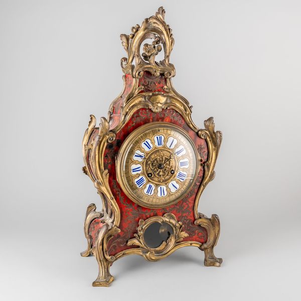 A FRENCH GILTMETAL-MOUNTED LOUIS XV STYLE BOULLE MANTEL CLOCK