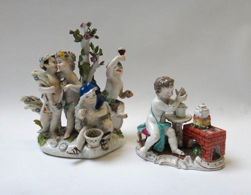Two Meissen figure groups; the first emblematic of the seasons, circa 1750, with blue crossed swords mark, incised 33, 19cm high, the second emblemati