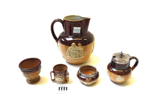 A Doulton harvest ware miniature tyg, 3.7cm high, a similar bowl with applied silver rim, a miniature silver mounted jug, an egg cup and a Royal Doult