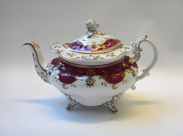 A Ridgway porcelain maroon and gilt part tea and coffee service, circa 1830-40, comprising; a teapot, cover and stand, a sucrier and cover, a milk jug