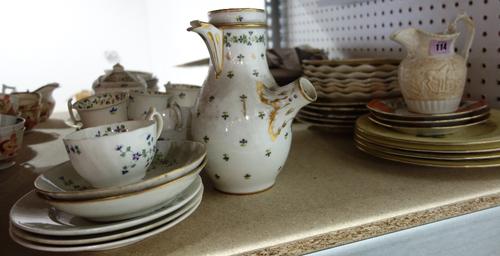 A group of ceramics, including; a Staffordshire part tea service decorated with green and blue flowers, a yellow ground floral painted dessert service