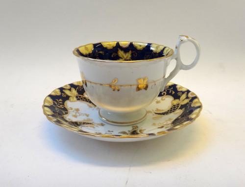 A group of twelve English porcelain cups and saucers, the majority Ridgway, 19th century, of various forms and decoration. (12)