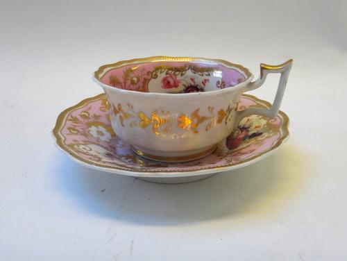 A group of eleven Ridgway porcelain cups and saucers, 19th century, of various forms and decoration, and a Cauldon bone china cup and saucer. (12)