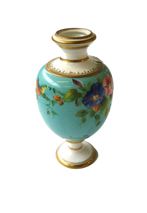 A Moore Bro's type figural tazza and nursery plates, a Paris porcelain cabinet cup and saucer, a pair of Masons stoneware plates, a pair of porcelain