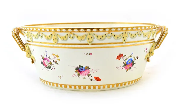A Chamberlain Worcester oval two-handled jardiniere, circa 1820, painted with scattered flower sprays and sprigs beneath a border moulded with deep cr