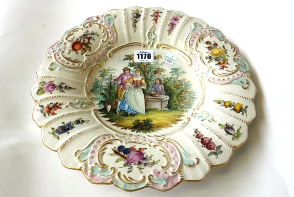 A Dresden Potschappel porcelain charger decorated with gallant and companion, together with four Rockingham style vases, a pair of biscuit porcelain f