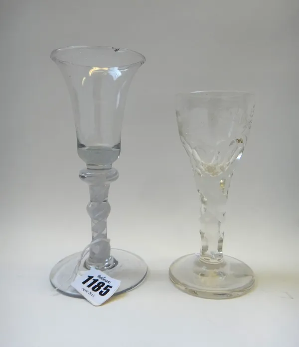 A Continental opaque twist wine glass, late 18th/19th century, the bell bowl raised on a knopped stem and plain foot, 16.5cm high, together with a fac
