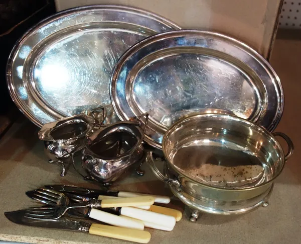 A quantity of silver plate including entree dishes, tea set, vases, bowls and sundry. (qty)