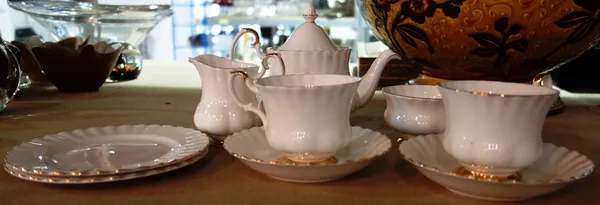 A Royal Albert bone china teaset including teapot, sugar bowl, milk jug, cups etc. (9).