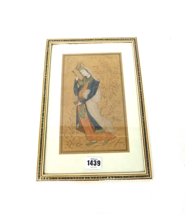 A Persian painting of a young woman, 19th/20th, watercolour on paper, painted standing in long robes holding a flask in one hand and a small bowl in t