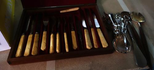 A quantity of silver-plated ware including cased knives, loose flatware and sundry. (qty)