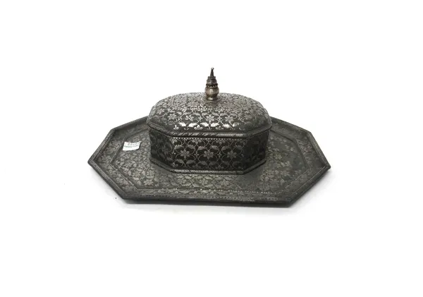 A silver inlaid Bidri pan set, Deccan, India, 19th century, of octagonal form, intricately inlaid with flowers and foliage, the shallow domed cover wi