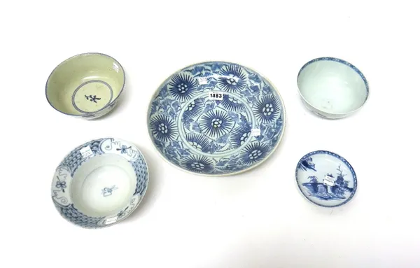 A group of Chinese blue and white shipwreck porcelains, 18th and 19th century, comprising; a `Starburst' pattern dish and a `Petal panel' bowl from th