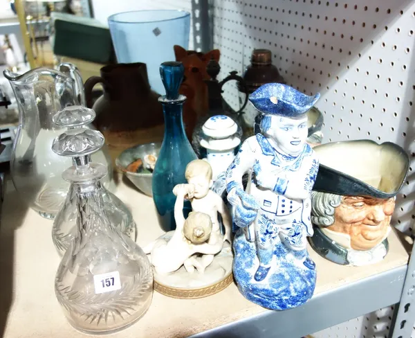 A quantity of ceramics and glass including decanters, a Beswick model of a Yorkshire terrier, a Whitefriars bubble inclusion vase, character jugs, coc