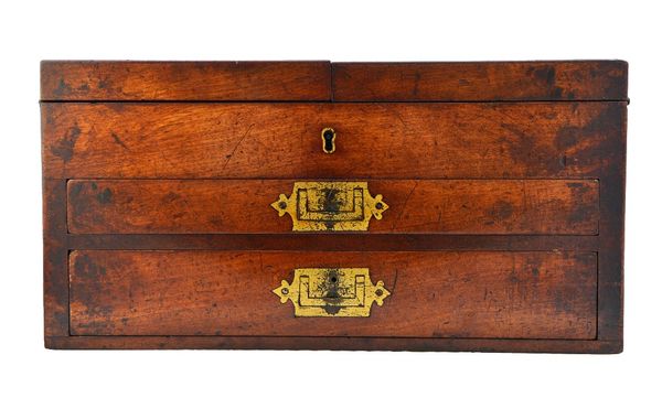 A George III mahogany travelling artist/miniaturist's double lift top box, with pull-out reversible undersides and double lock over a pair of drawers,