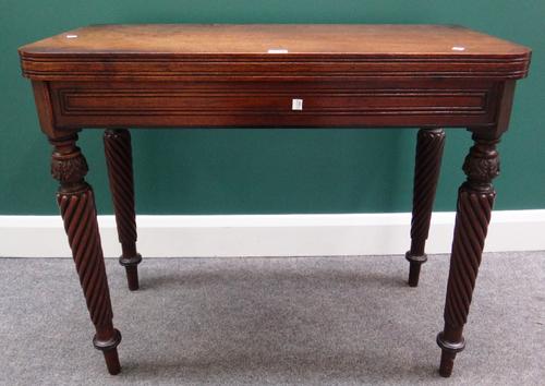 A 19th century Scottish mahogany card table, on spiral fluted supports, 91cm wide.