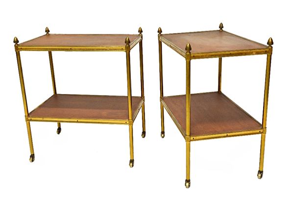 A pair of early 20th century rectangular two tier tables with leather inserts on lacquered brass supports, 47cm wide.  Illustrated