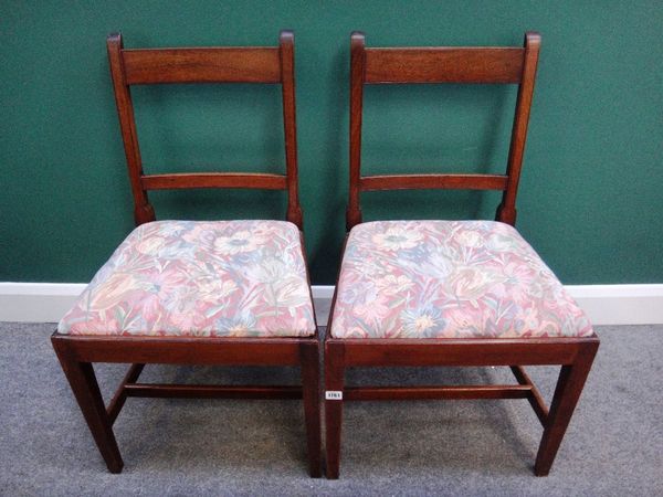 A set of six early 19th century mahogany bar back dining chairs on tapering square supports.