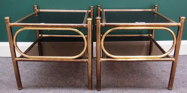 A pair of 20th century tubular brass and smoked glass square two tier occasional tables, 50cm wide.