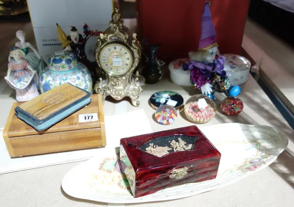 A group of ceramics and collectibles including Doulton items, glass paperweights, a brass clock and sundry. (qty)