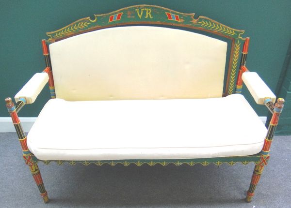 An early 20th century Indian polychrome painted open arm sofa on tapering turned supports, 137cm wide.Provenance:  by repute, this piece was originall