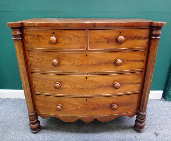 A mid-19th century mahogany bowfront chest of two short and three long graduated drawers flanked by outstepped octagonal corners, 130cm wide.