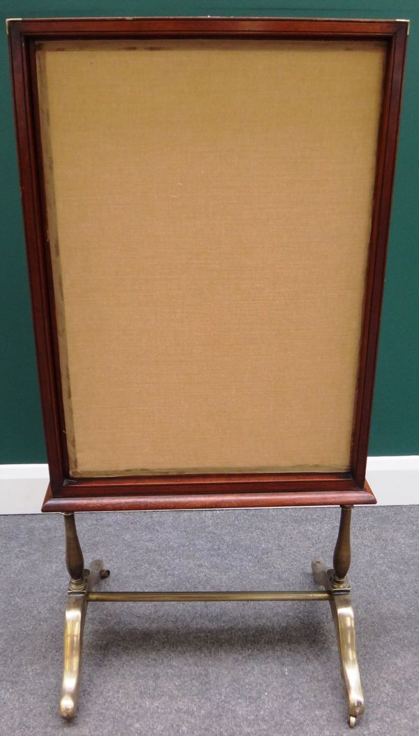 A 19th century brass bound mahogany campaign style rood/dressing screen, the rectangular central panel with three way extendable panels, on four brass